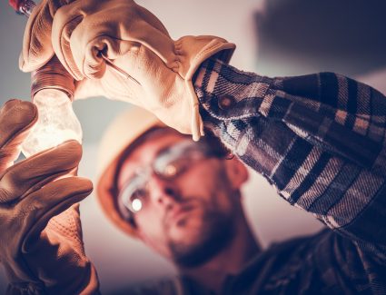 Electrician Fixing the Light